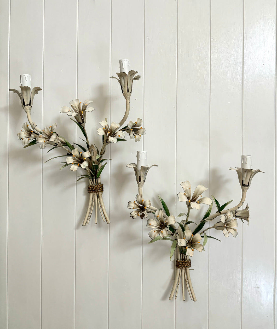 Pair of white tole lily sconces