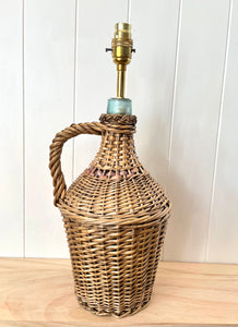 Large vintage rattan demijohn lamp