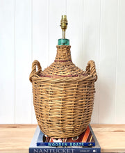 Load image into Gallery viewer, Large vintage rattan demijohn lamp

